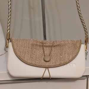 Ju'sto adjustable purse/clutch with braided strap